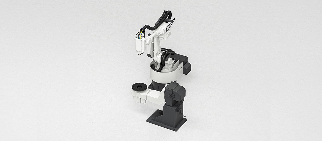 configuração de célula de solda com robô e mesa rotativa inclinável